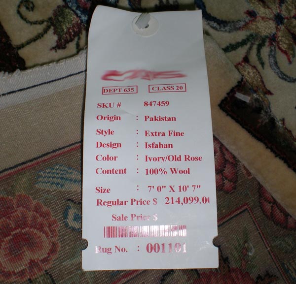 Wow! $215,000 Rug for 50K?  This is no Museum Rug, it's a LIE