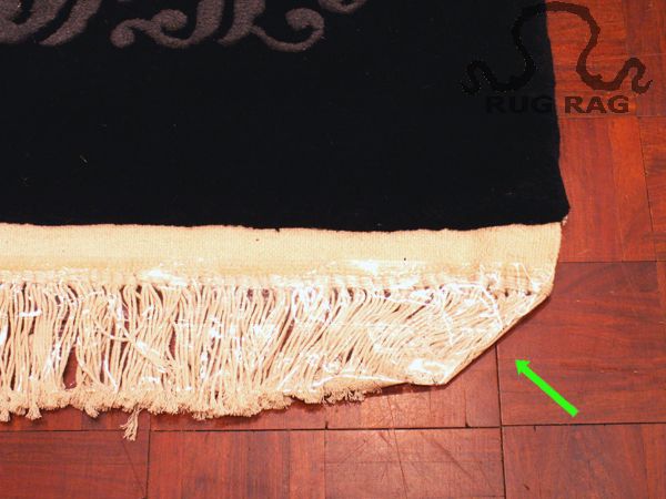 Fully covered and taped up fringe.  Push corner tassles in so they do not interfer aesthetically