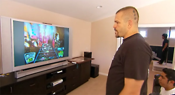 Liddell and his home entertainment system of Playstation, Xbox and other