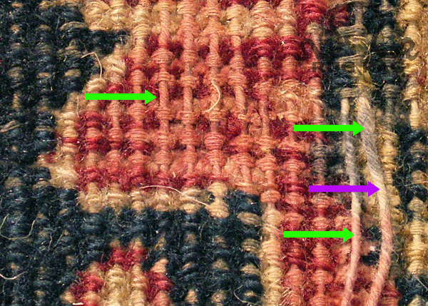 Warps of an antique Kerman Rug touched up with Markers to disguise wear in threadbare areas