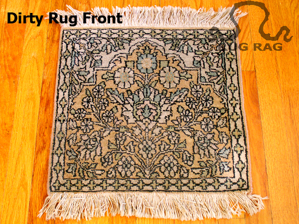 front of a dirty rug