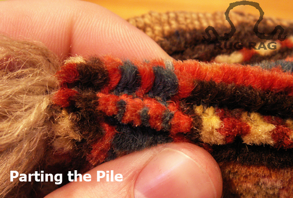 Parting the pile on a Karabagh rug